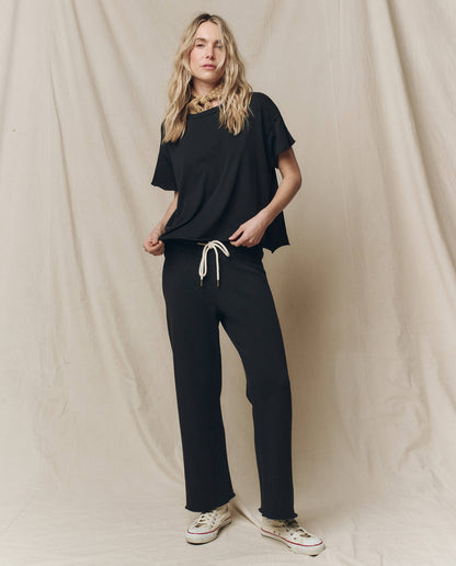 The Wide Leg Cropped Sweatpant. -- Almost Black