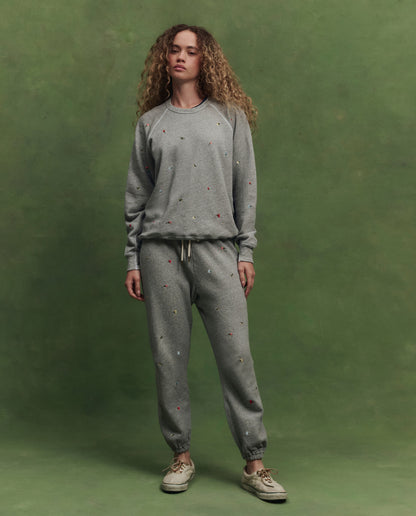 The College Sweatshirt w/ Tossed Floral Embroidery. -- Varsity Grey