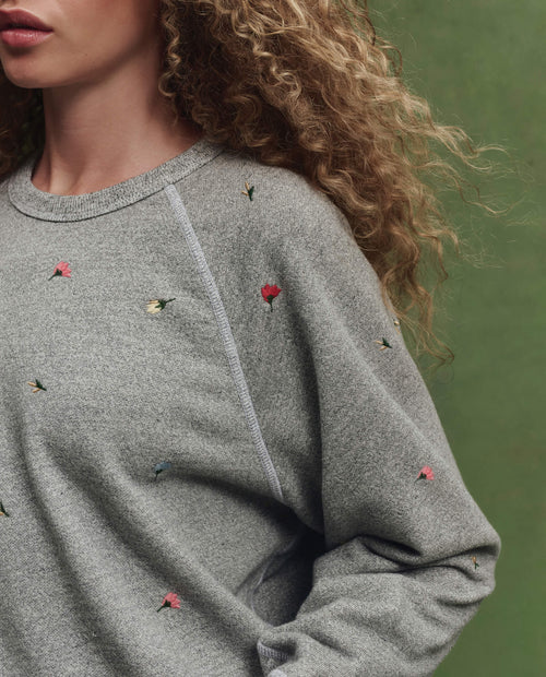 The College Sweatshirt w/ Tossed Floral Embroidery. -- Varsity Grey